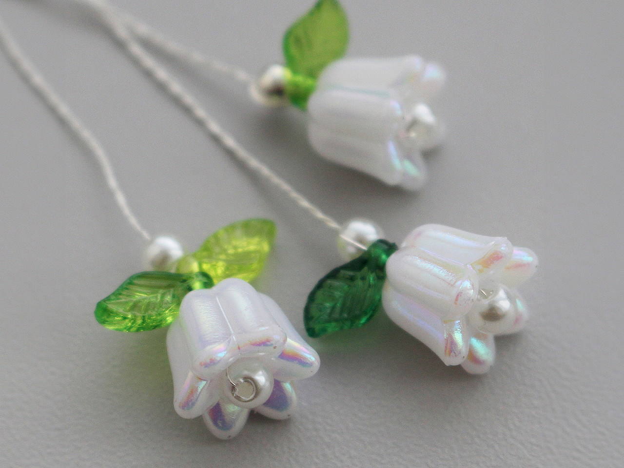 Plastic beads with ab effect bell / skirt 12x14 mm - Pearlwhite (20 Pieces)